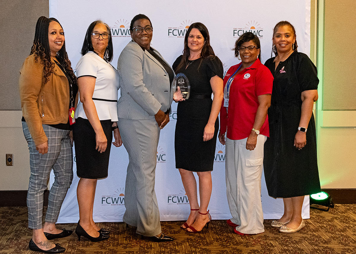 The JTA team with the Gold Award for Excellence in Worksite Wellness