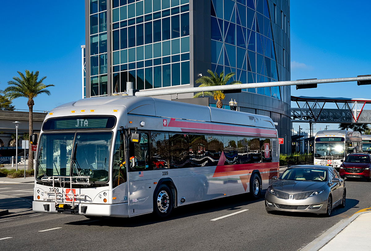 Photo of a JTA fixed-route bus in front of the JRTC